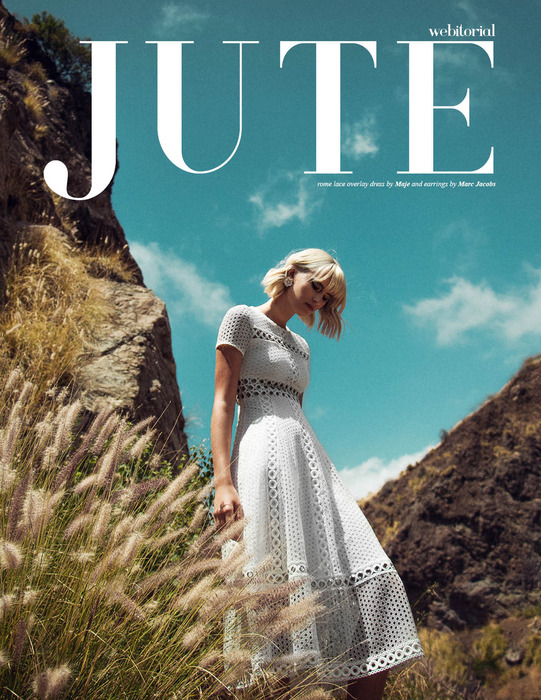 Fashion editorial photographed in a dramatic natural landscape